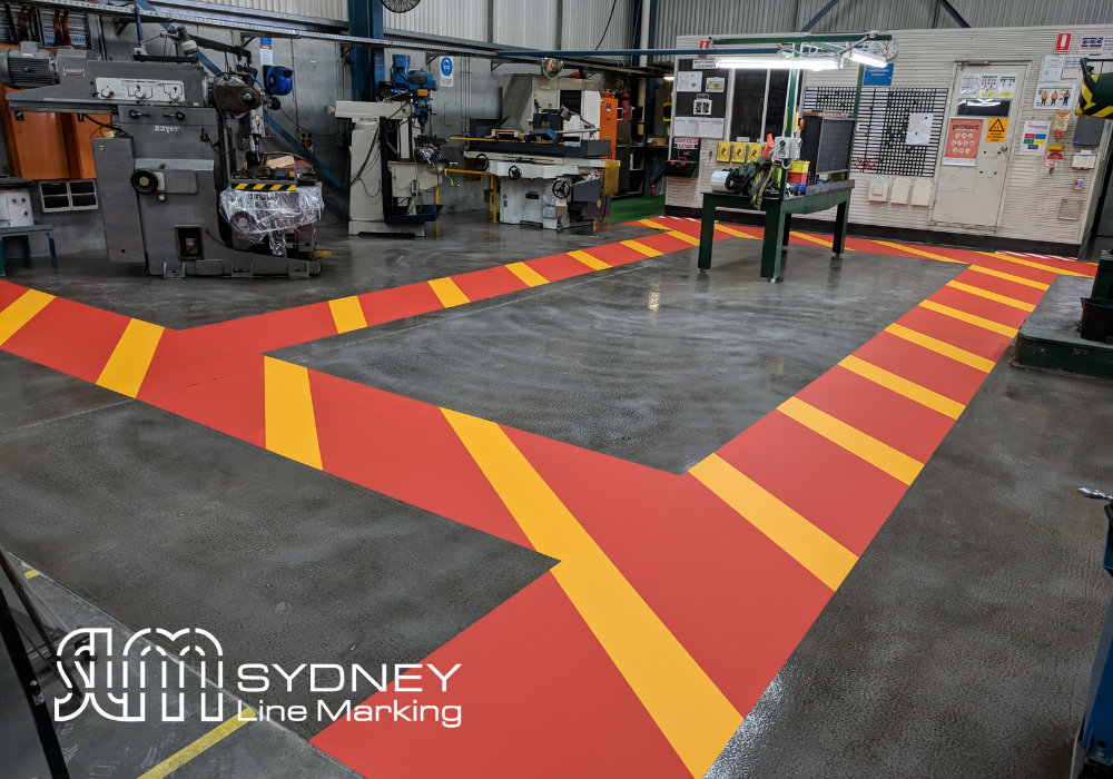 red and yellow line marking in an industrial factory